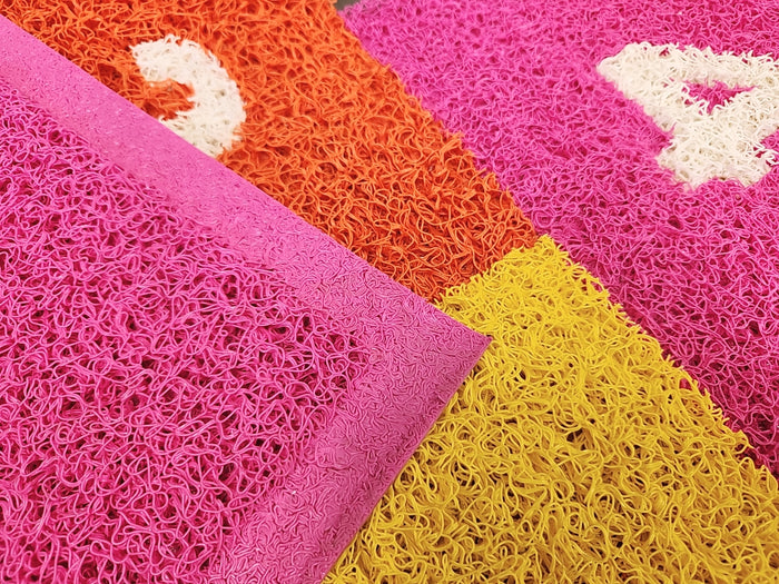 Straight molded edge on PVC coil mat